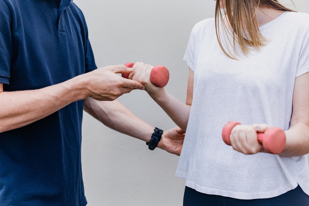 Physical therapist treating a patient in an allied health clinic