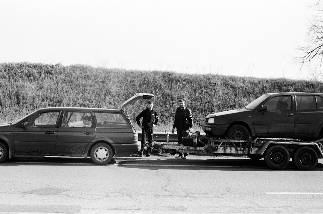 Multi-level car carrier trailer loaded with vehicles, illustrating auto-hauler insurance coverage for car-carrier operators