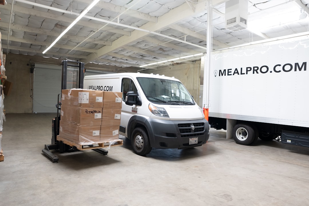 Semi-trucks loading at a food distribution warehouse facility