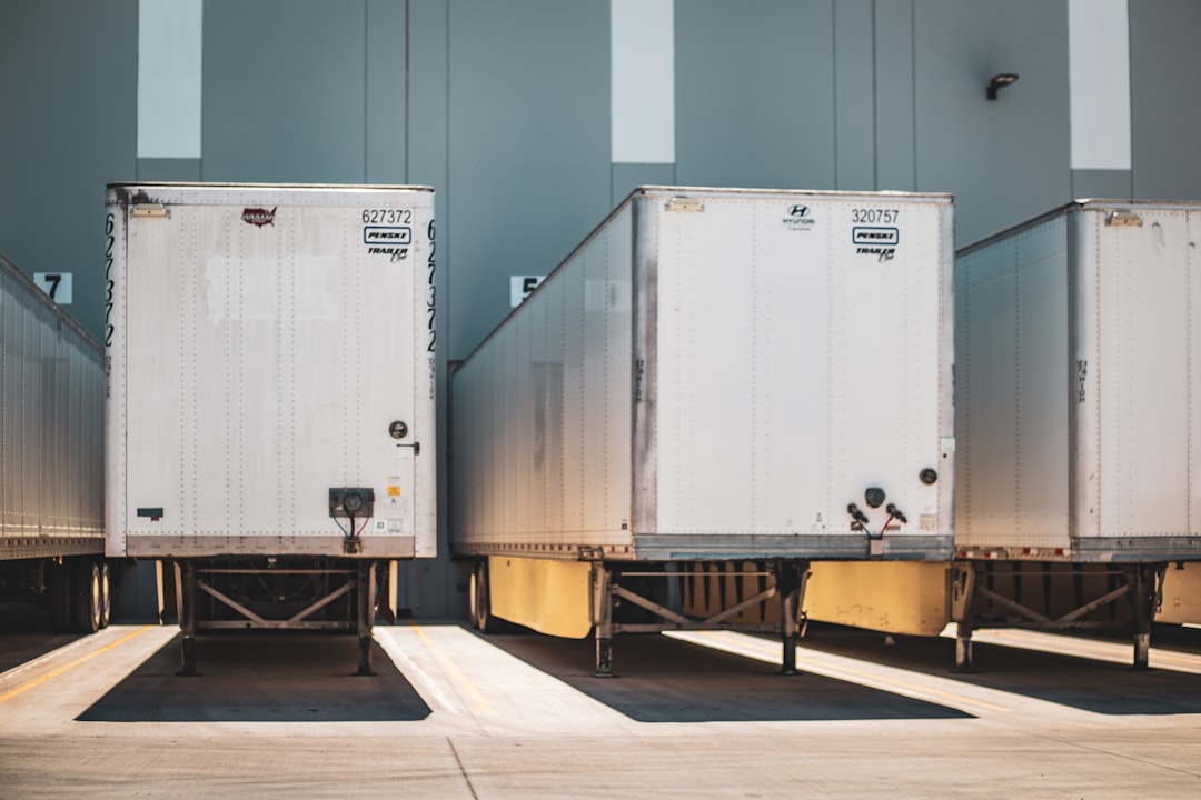 Refrigerated semi-truck at a cold storage food distribution facility loading dock