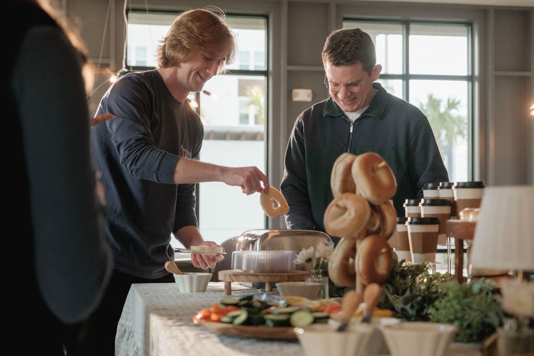 Catering staff setting up a buffet at an off-premise event venue, illustrating restaurant catering insurance