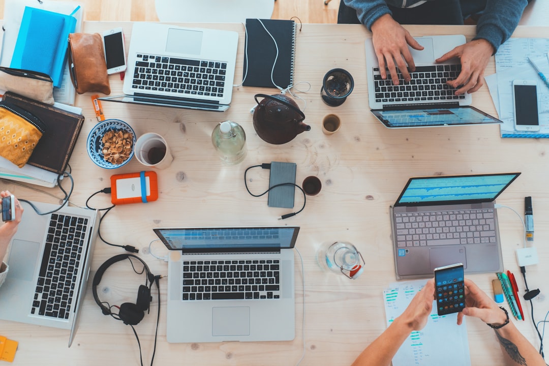 Software team working in an office, representing tech and SaaS insurance FAQs